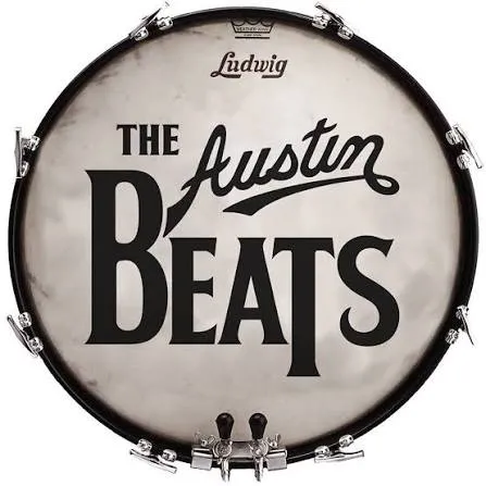 Bass drum head with Ludwig logo and text 'The Austin Beats' in black lettering.
