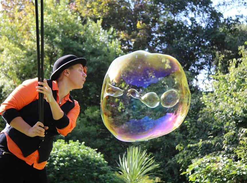 Bubbleologist blowing bubbles